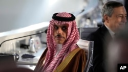 Saudi Arabia's Prince Faisal bin Farhan Al Saud waits for the start of a round table meeting at the La Nuvola conference center as part of the G-20 Summit in Rome, Italy, Oct. 30, 2021. 