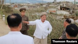 North Korea's leader Kim Jong Un inspects an unspecified area after North Korea was affected by Typhoon Maysak in this image released Sept. 5, 2020 by North Korea's Korean Central News Agency. 