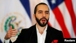 FILE - El Salvador's President Nayib Bukele speaks during a meeting with U.S. Secretary of State Mike Pompeo at the Presidential House in San Salvador, El Salvador, July 21, 2019. 