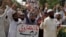 Supporters of a religious group hold a demonstration in Lahore, Pakistan, on Sept. 30, 2023, to condemn Friday's deadly bombing in Mastung.