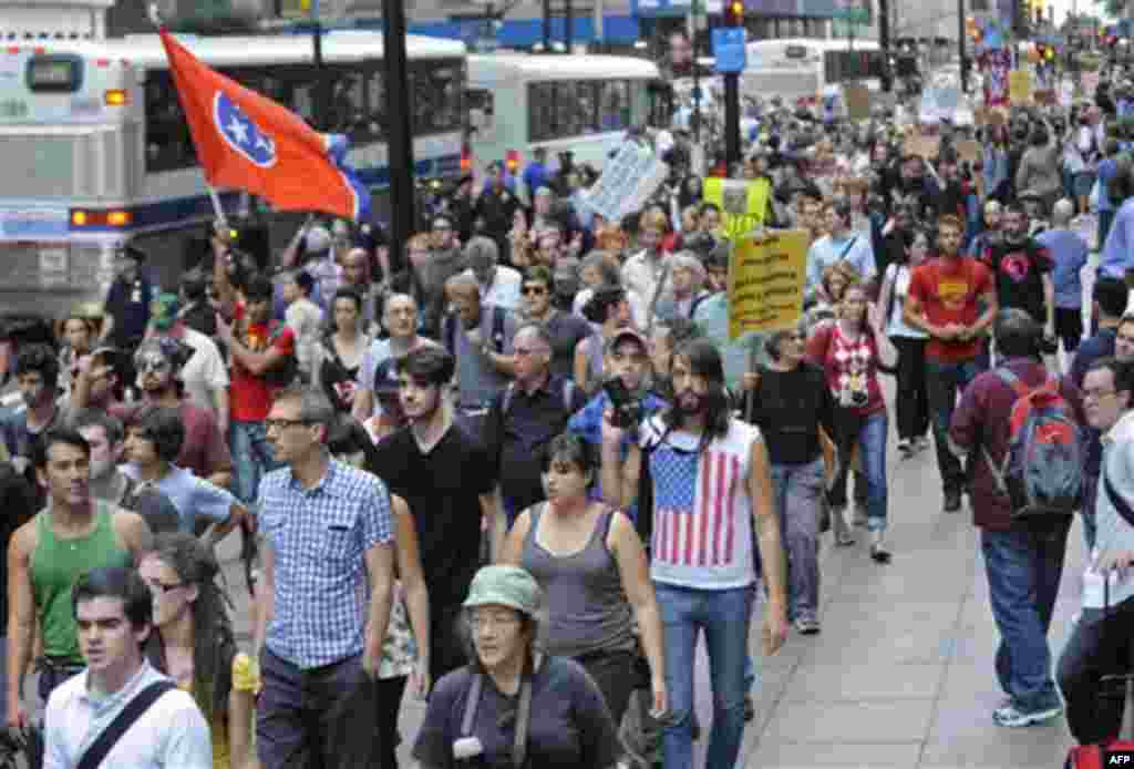 A several block long crowd of protestors march up Broadway towards Police Headquarters, Friday, Sept. 30, 2011, in New York. The "Occupy Wall Street" protest is in its second week, as demonstrators speak out against corporate greed and social inequality. 