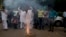 Congress party supporters light crackers outside the residence of their leader Rahul Gandhi as they celebrate his return from holidays in New Delhi, India, April 16, 2015.