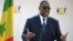 Le président sénégalais Macky Sall fait un geste en s'adressant à la réunion d'été de l'association patronale MEDEF au complexe hippique de Longchamp, à Paris le 27 août 2020.