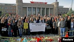 People attend a commemoration for the victims of the October 10 bombings in Ankara, Turkey, Oct. 17, 2015.