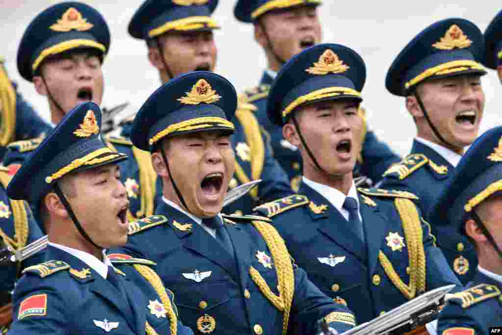 Military honor guards attend a welcome ceremony of French President Emmanuel Macron at the Great Hall of the People in Beijing.