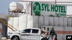 FILE—Somali security forces guard the entrance to the SYL hotel which was attacked by al-Shabab Islamic extremist rebels on Tuesday night, in Mogadishu, Somalia, December 11, 2019. 