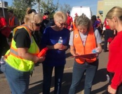 Then-Mayor Thelda Williams (second from left) attends a neighborhood smoke alarm awareness walk, October 2018. (City of Phoenix)