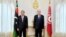 Tunisian President Kais Saied, right, and Libyan Prime Minister Abdul Hamid Dbeibah pose for a photo in Tunis, Tunisia, Sept. 9, 2021. 