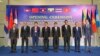 Ministers from countries of the Mekong Memorandum of Understanding (MOU) on Drug Control, and a UNODC representative, pose for a photograph after a morning meeting, in Bangkok, Thailand November 15, 2019. REUTERS/Panu Wong Cha-um - RC2NBD9E6C4D