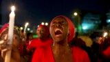 A woman shouts during a vigil in Abuja calling for the release of Nigerian schoolgirls abducted in the remote village of Chibok.