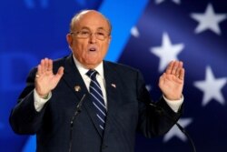 FILE - Rudy Giuliani, former Mayor of New York City, speaks at an event in Ashraf-3 camp, which is a base for the People's Mojahedin Organization of Iran (MEK) in Manza, Albania, July 13, 2019.