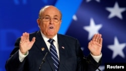 FILE - Rudy Giuliani, former Mayor of New York City, speaks at an event in Ashraf-3 camp, which is a base for the People's Mojahedin Organization of Iran (MEK) in Manza, Albania, July 13, 2019. 