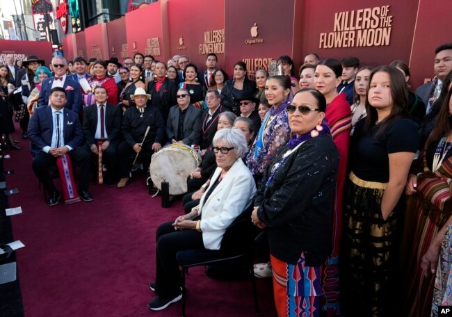 Members of Osage Nation pose for a group photo on the red carpet at the Los Angeles premiere of the film "Killers of the Flower Moon," Monday, Oct. 16, 2023, at the Dolby Theater. (AP Photo/Chris Pizzello)