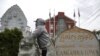 In this Sept. 26, 2019 photo, a man of Cambodian descent, who has lived in the United States since childhood and is now facing possible deportation, poses in Lowell, Mass. (AP Photo/Elise Amendola)