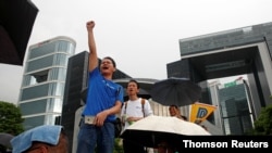 Pro-government supporters attend a rally to call for an end to violence, after a wave of protests against an extradition bill triggered clashes between police and activists, in Hong Kong, July 20, 2019.