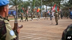 Les troupes onusiennes lors d'une cérémonie à Bangui, en Centrafrique, le 15 septembre 2014.