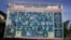 A police billboard shows a list of individuals, including the country's top militant Santoso (top L), wanted in relation with terrorism cases in Poso, Indonesia's Central Sulawesi province, Dec. 19, 2015. 