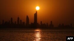 Coucher du soleil à Koweït City (Yasser al Zayyat/ AFP)