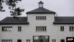 FILE - The main gate in the former Sachsenhausen concentration camp, now a memorial, is seen in Oranienburg, north of Berlin, Germany, Feb. 7, 2020.