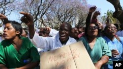 Zimbabwean medical staff march on the streets of Harare, Sept. 19, 2019.