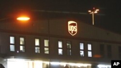 The UPS building at the East Midlands airport, Derby, England, 29 Oct 2010, after UPS cargo containers were searched by British police at the East Midlands airport, in Derby, about two hours north of London