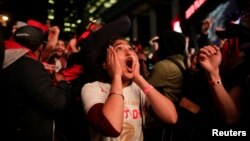 Fans celebrate after the Toronto Raptors defeated the Golden State Warriors in Oakland, California in Game Six of the best-of-seven NBA Finals, in Toronto, Ontario, Canada, June 14, 2019.