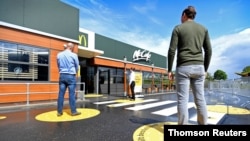 Designated waiting spots to separate customers in Arnhem, could become a feature of McDonald's restaurants in the Netherlands.
