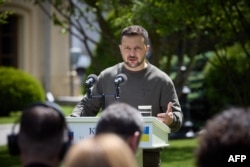 Ukrainian President Volodymyr Zelenskyy speaks to the media during a press conference in Kyiv on May 10, 2024. Reports say that Ukrainian counterintelligence investigators thwarted a plan by Russian agents to assassinate Zelenskyy (Ukrainian Presidential Press Service via AFP)