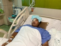 Pro-democracy activist Sirawith Seritiwat is recuperating in a hospital following last week's attack on him, in Bangkok, Thailand, July 3, 2019.