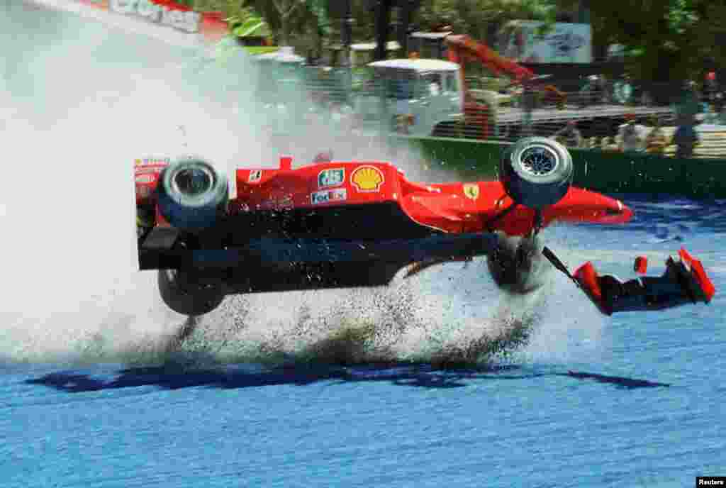 Michael Schumacher's car is airborne during a crash in the first practice session for the Australian Formula One Grand Prix in Melbourne, March 2, 2001.