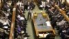 FILE - Prime Minister Morgan Tsvangirai (R) delivers his first speech as Prime Minister at the Zimbabwean parliament in Harare, March 4, 2009.