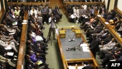 FILE - Prime Minister Morgan Tsvangirai (R) delivers his first speech as Prime Minister at the Zimbabwean parliament in Harare, March 4, 2009.