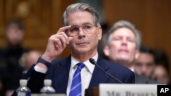 Scott Bessent, President-elect Donald Trump's choice to be secretary of the treasury, appears before the Senate Finance Committee for his confirmation hearing, at the Capitol in Washington, Jan. 16, 2025.