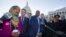 FILE - Rep. Ilhan Omar, D-Minn., left, Rep. Mike Levin, D-Calif., Rep. Christopher Pappas, D-N.H., Rep. Joe Neguse, D-Colo., and other freshmen member of the House of Representatives speak on Capitol Hill.