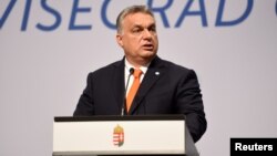 FILE - Prime Minister of Hungary Viktor Orban attends a news conference in Budapest, Hungary, June 21, 2018.