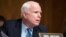 FILE - Senator John McCain (R-AZ) speaks on Capitol Hill in Washington, July 9, 2014. 