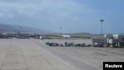 FILE - A passenger aircraft taxis after landing at Beirut airport, Lebanon, March 16, 2016. 