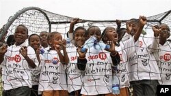 Children participate in the launch of a global plan to stop TB, in Alexandra Township north of Johannesburg, 13 Oct 2010