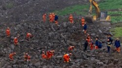 Dalam foto yang dirilis oleh Kantor Berita Xinhua ini, tim penyelamat mencari korban tanah longsor di daerah Junlian dekat kota Yibin di Provinsi Sichuan, China barat daya, 9 Februari 2025.