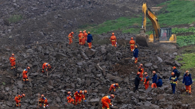 Rescuers recover 1 body and search for 28 people in a landslide in southwest China