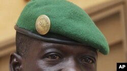 Captain Amadou Sanogo, leader of Mali's military junta, speaks during a news conference at his headquarters in Kati, outside Bamako, March 30, 2012. 