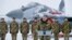 Ukrainian President Petro Poroshenko addresses the Armed Forces of Ukraine at the military airfield in Vasylkiv region, Ukraine, Dec. 1, 2018, as Poroshenko transferred new aircraft and military equipment to the Ukrainian Armed Forces.