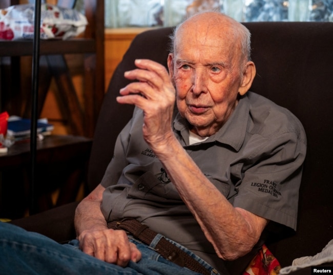 Jake Larson, a 101-year-old World War II veteran who participated in D-Day, history's largest amphibious invasion, at Omaha Beach on June 6, 1944, looks on during an interview with Reuters at his home in Martinez, California, U.S. May 20, 2024. (REUTERS/Dylan Bouscher)