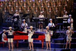 FILE - The Moranbong Band, an all-female North Korean pop band formed by leader Kim Jong Un, performs at a concert marking the end of the 7th Workers' Party Congress in Pyongyang, North Korea, May 11, 2016.