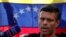 FILE - Venezuelan opposition leader Leopoldo Lopez talks to reporters at the residence of the Spanish ambassador in Caracas, Venezuela, May 2, 2019.