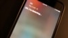 FILE - An iPhone screen displays a message from Siri, Oct. 29, 2019, in Washington. (VOA)