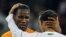 Ivory Coast's Didier Drogba, left, greets Portugal's Ricardo Carvalho at the end of  the World Cup group G soccer match between Ivory Coast and Portugal at Nelson Mandela Bay Stadium in Port Elizabeth, South Africa, Tuesday, June 15, 2010. The game ended 