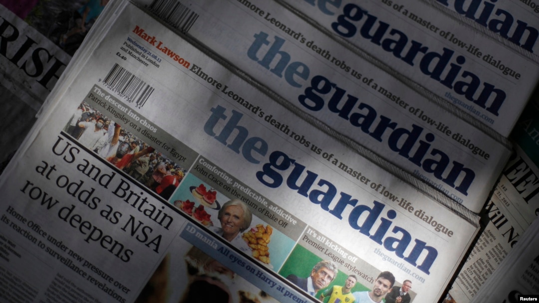 Copies of the Guardian newspaper are displayed at a news agent in London, Aug. 21 2013.