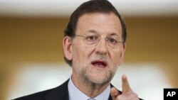 Spain's Prime Minister Mariano Rajoy speaks during a press conference at the Moncloa Palace, in Madrid, June 10, 2012.