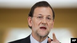 Spain's Prime Minister Mariano Rajoy speaks during a press conference at the Moncloa Palace, in Madrid, June 10, 2012.